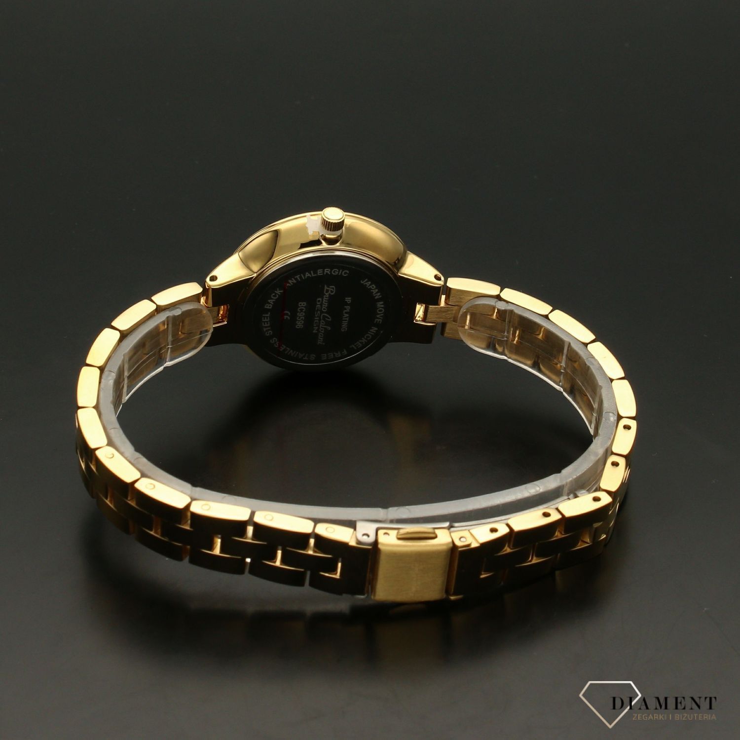 Zegarek damski BRUNO CALVANI złoty BC9596 DOUBLE GOLD. Zegarek damski w złotej kolorystyce z wyraźną tarczą. Zegarek damski wyposażony w mechanizm kwarcowy zasilany na baterię. Zegarek damski  (2).jpg